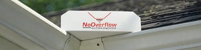 A no outflow sign on the roof of a house.